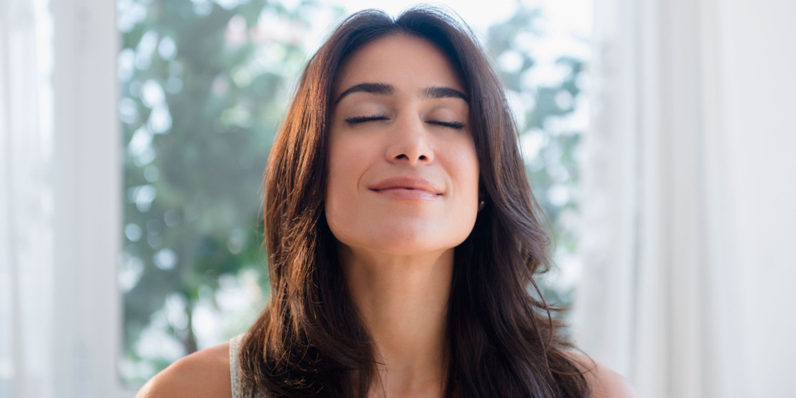 1461318018-woman-doing-breathing-exercises